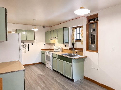 4117 11Th Avenue W, Vancouver, BC - Indoor Photo Showing Kitchen With Double Sink