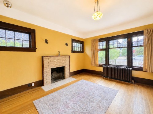 4117 11Th Avenue W, Vancouver, BC - Indoor Photo Showing Other Room With Fireplace