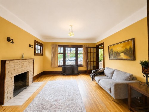 4117 11Th Avenue W, Vancouver, BC - Indoor Photo Showing Living Room With Fireplace