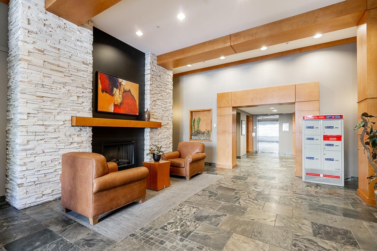 414-2958 Silver Spring Boulevard, Coquitlam, BC - Indoor With Fireplace