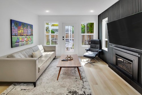 2977 6Th Avenue W, Vancouver, BC - Indoor Photo Showing Living Room With Fireplace