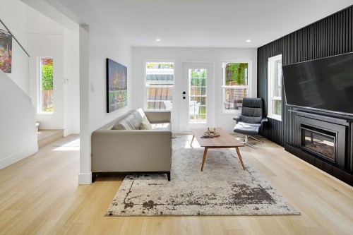 2977 6Th Avenue W, Vancouver, BC - Indoor Photo Showing Living Room With Fireplace