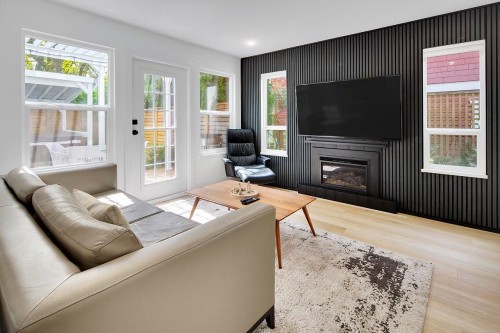 2977 6Th Avenue W, Vancouver, BC - Indoor Photo Showing Living Room With Fireplace