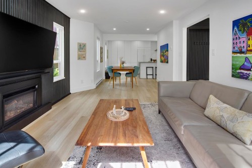 2977 6Th Avenue W, Vancouver, BC - Indoor Photo Showing Living Room With Fireplace