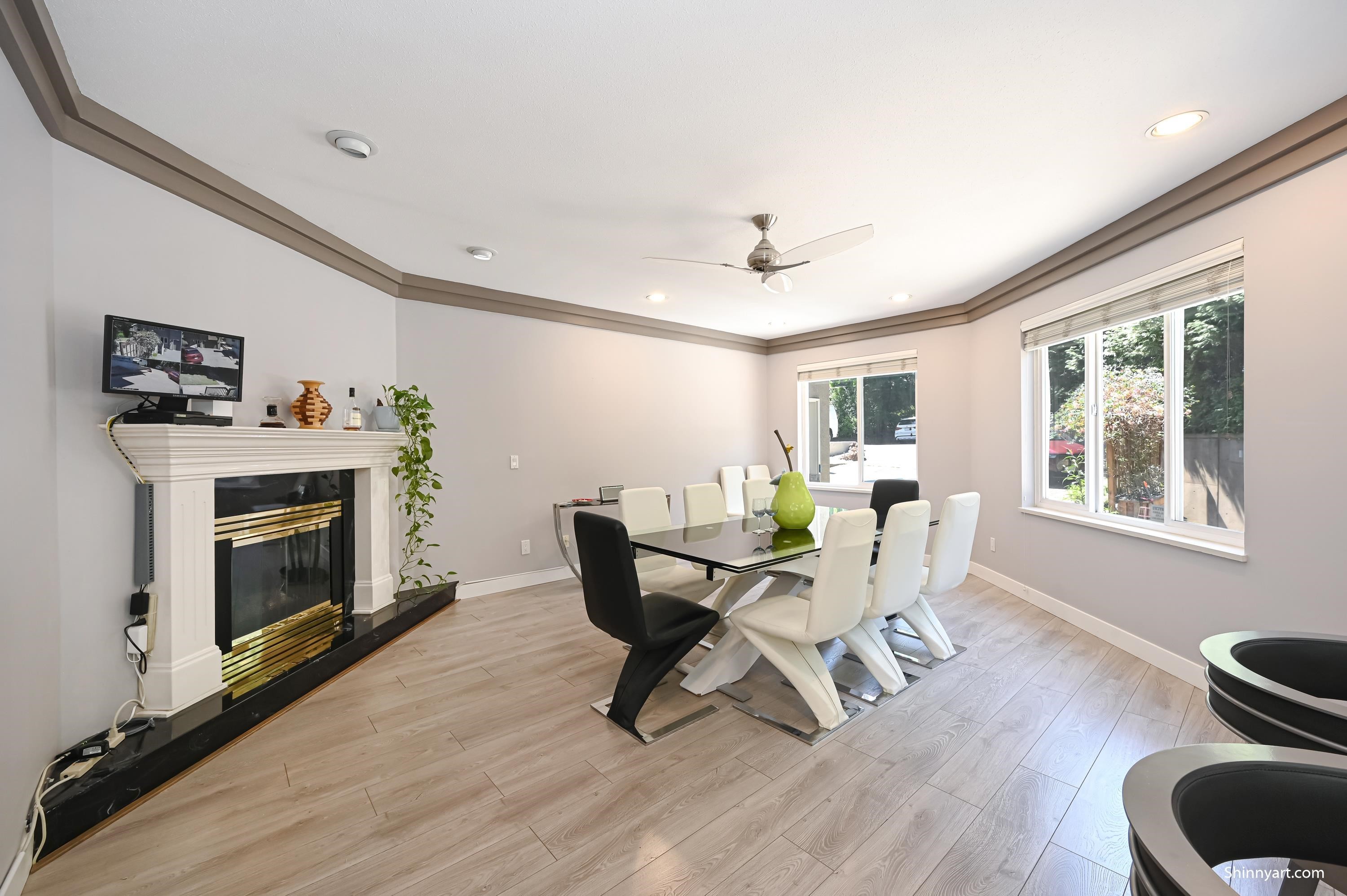 6339 Canada Way, Burnaby, BC - Indoor Photo Showing Dining Room With Fireplace