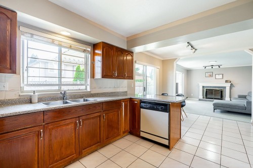 10288 Hall Avenue, Richmond, BC - Indoor Photo Showing Kitchen With Fireplace With Double Sink