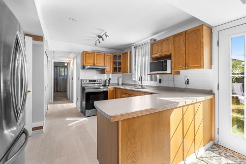 1728 Pekrul Place, Port Coquitlam, BC - Indoor Photo Showing Kitchen With Double Sink