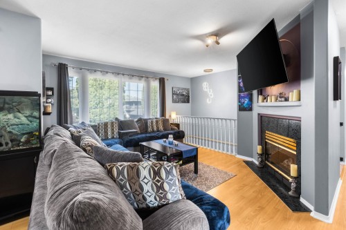 1728 Pekrul Place, Port Coquitlam, BC - Indoor Photo Showing Living Room With Fireplace
