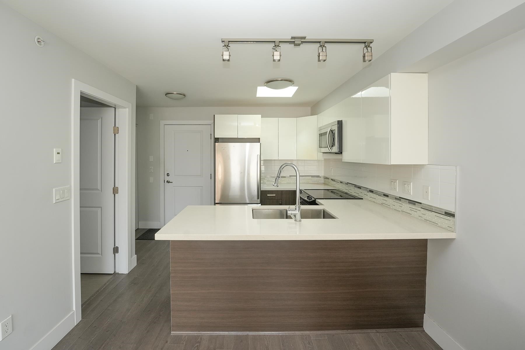 403-2408 Broadway E, Vancouver, BC - Indoor Photo Showing Kitchen With Double Sink