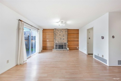 9400 Mcburney Drive, Richmond, BC - Indoor Photo Showing Living Room With Fireplace