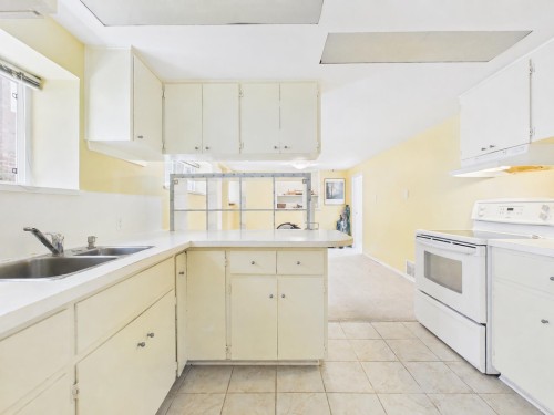 3035 5Th Avenue W, Vancouver, BC - Indoor Photo Showing Kitchen With Double Sink