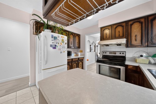 4657 Slocan Street, Vancouver, BC - Indoor Photo Showing Kitchen With Double Sink