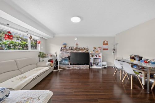 4657 Slocan Street, Vancouver, BC - Indoor Photo Showing Living Room With Fireplace