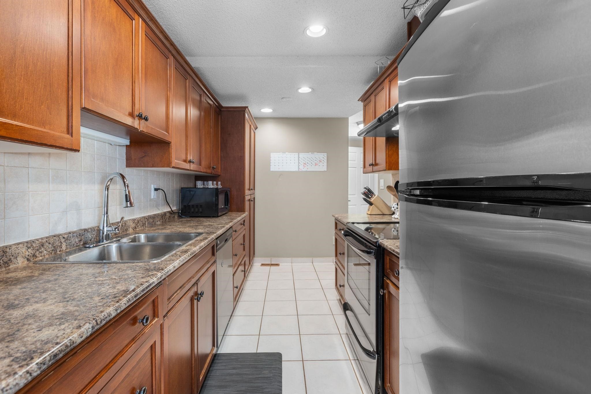 9010 Centaurus Circle, Burnaby, BC - Indoor Photo Showing Kitchen With Double Sink