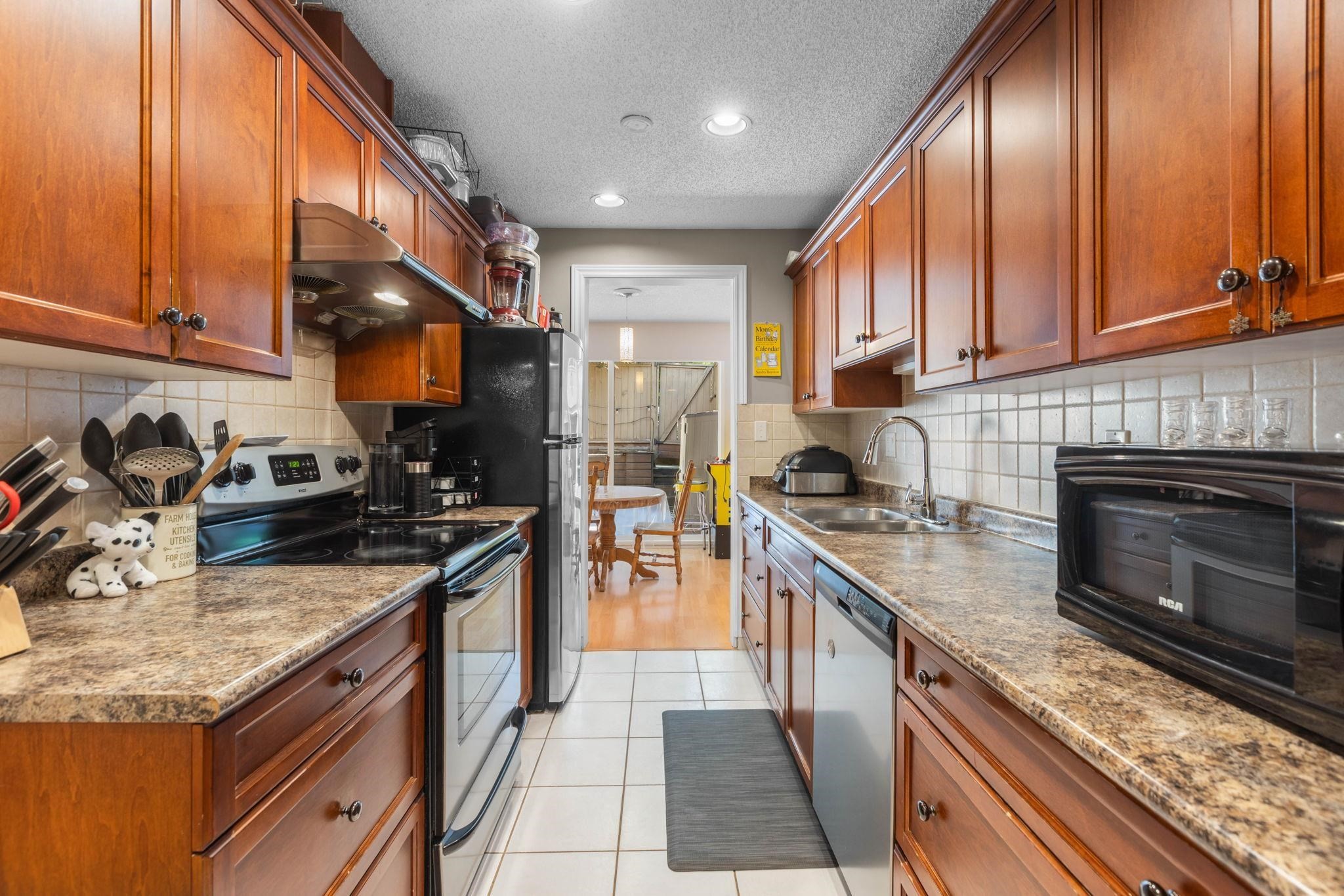9010 Centaurus Circle, Burnaby, BC - Indoor Photo Showing Kitchen With Double Sink