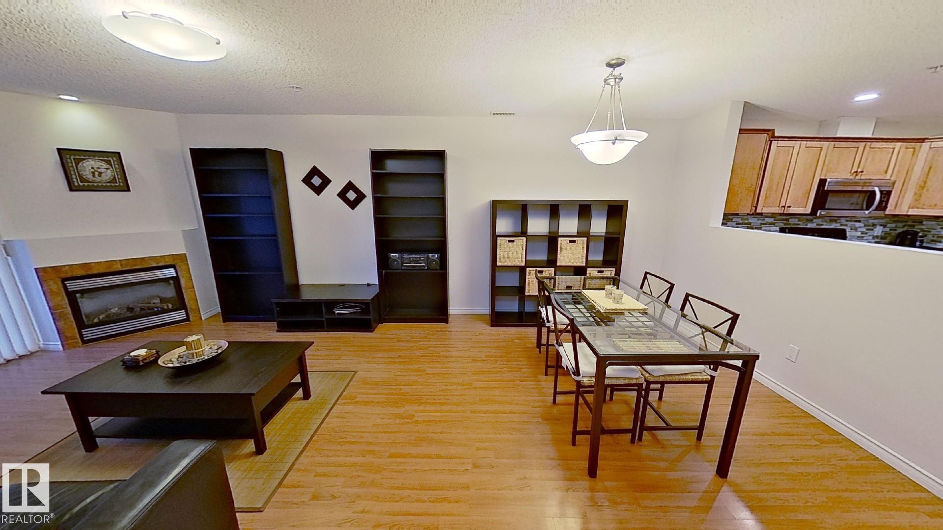 119 12110 106 Avenue Nw, Edmonton, AB - Indoor With Fireplace