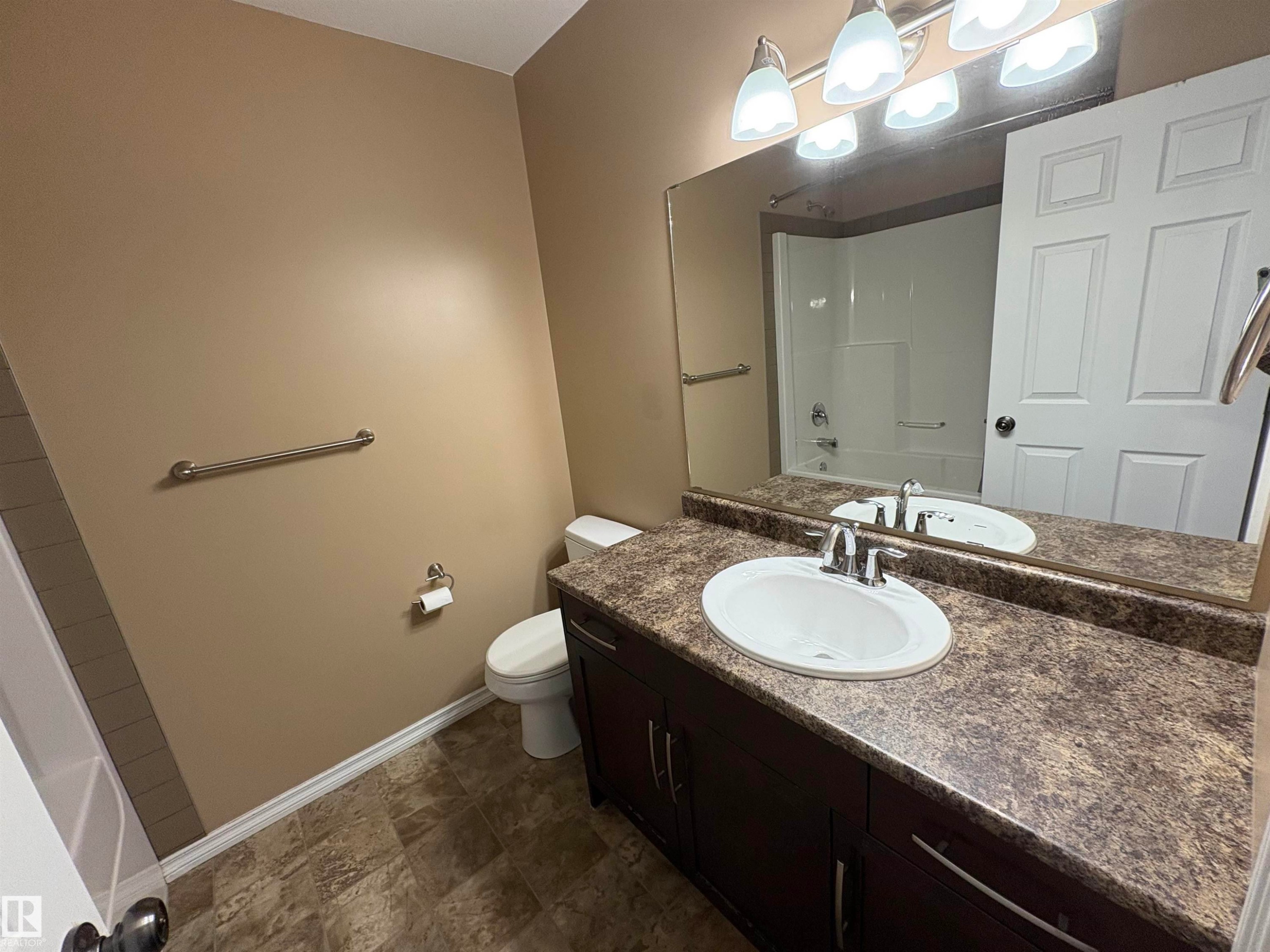 Full bath featuring vanity, shower - 5302 Railway Avenue, Elk Point, AB - Indoor Photo Showing Bathroom