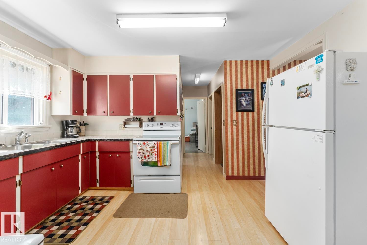4715 47 Avenue, Cold Lake, AB - Indoor Photo Showing Kitchen With Double Sink