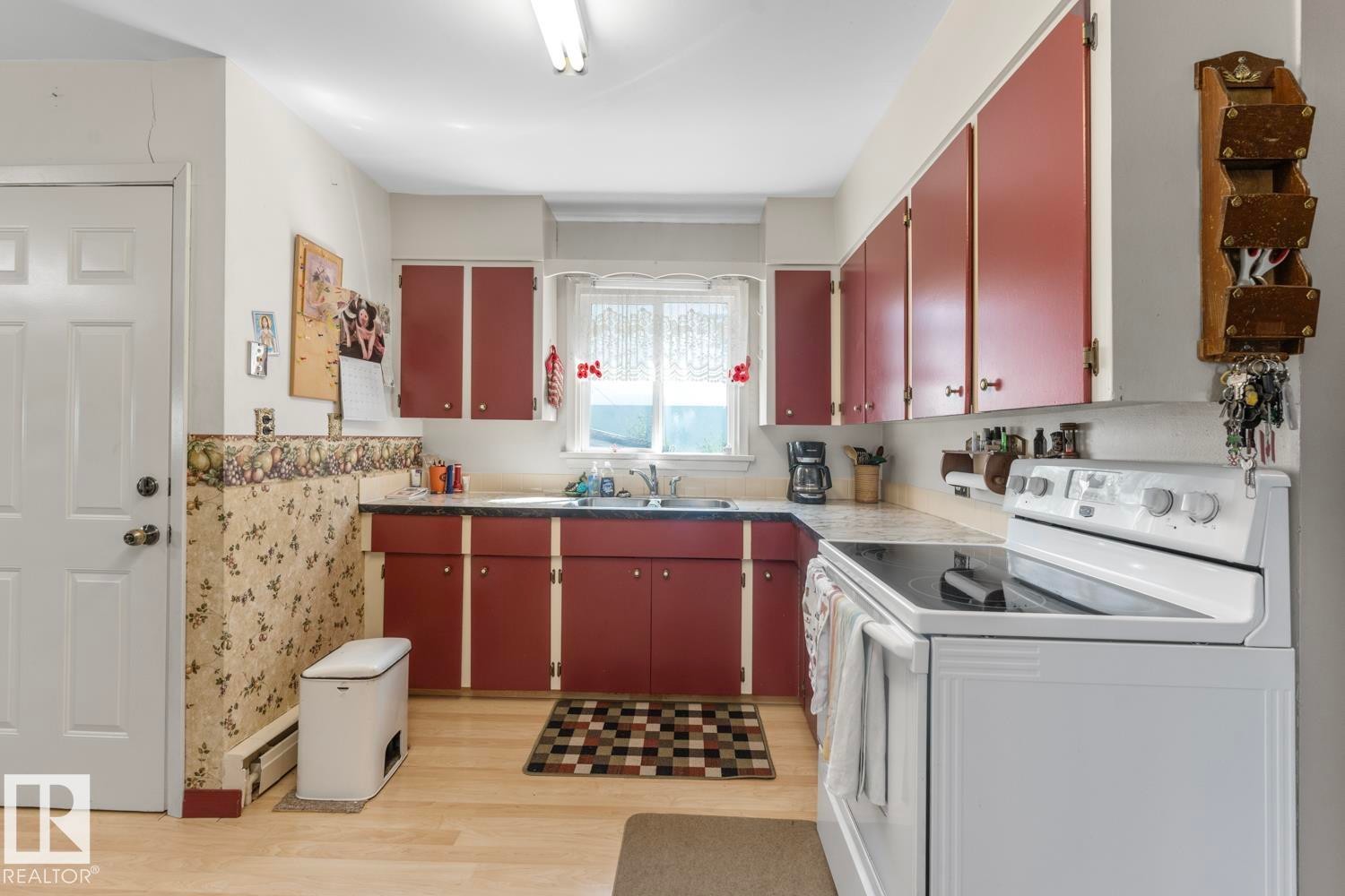 4715 47 Avenue, Cold Lake, AB - Indoor Photo Showing Kitchen With Double Sink