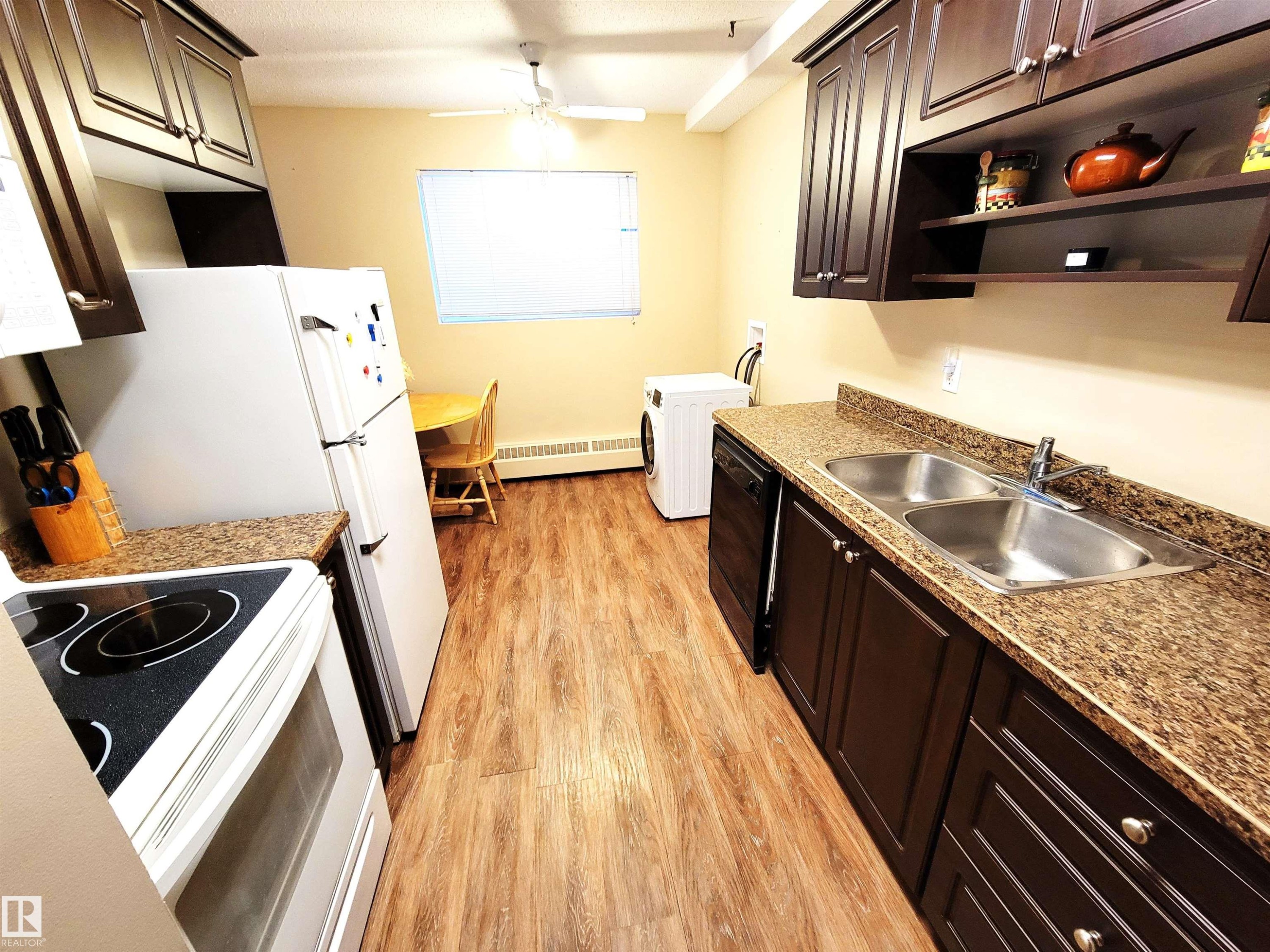 101 911 10 Street, Cold Lake, AB - Indoor Photo Showing Kitchen With Double Sink