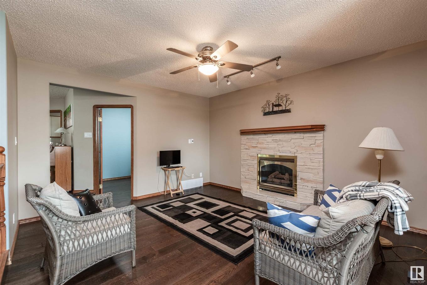 4126 46 Street, Vegreville, AB - Indoor Photo Showing Living Room With Fireplace