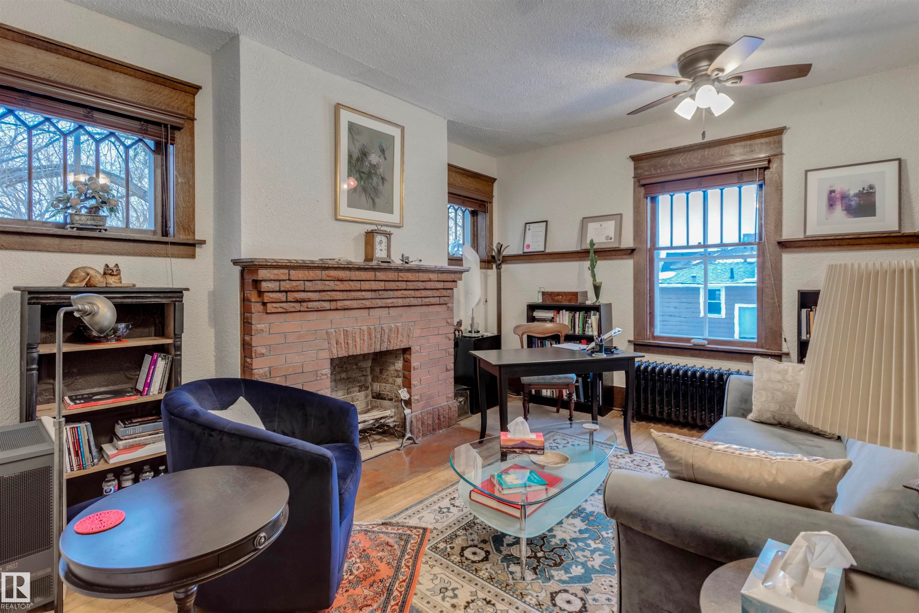 10417 Saskatchewan Drive, Edmonton, AB - Indoor Photo Showing Living Room With Fireplace