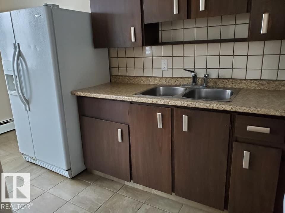 5014 52 Avenue, Glendon, AB - Indoor Photo Showing Kitchen With Double Sink
