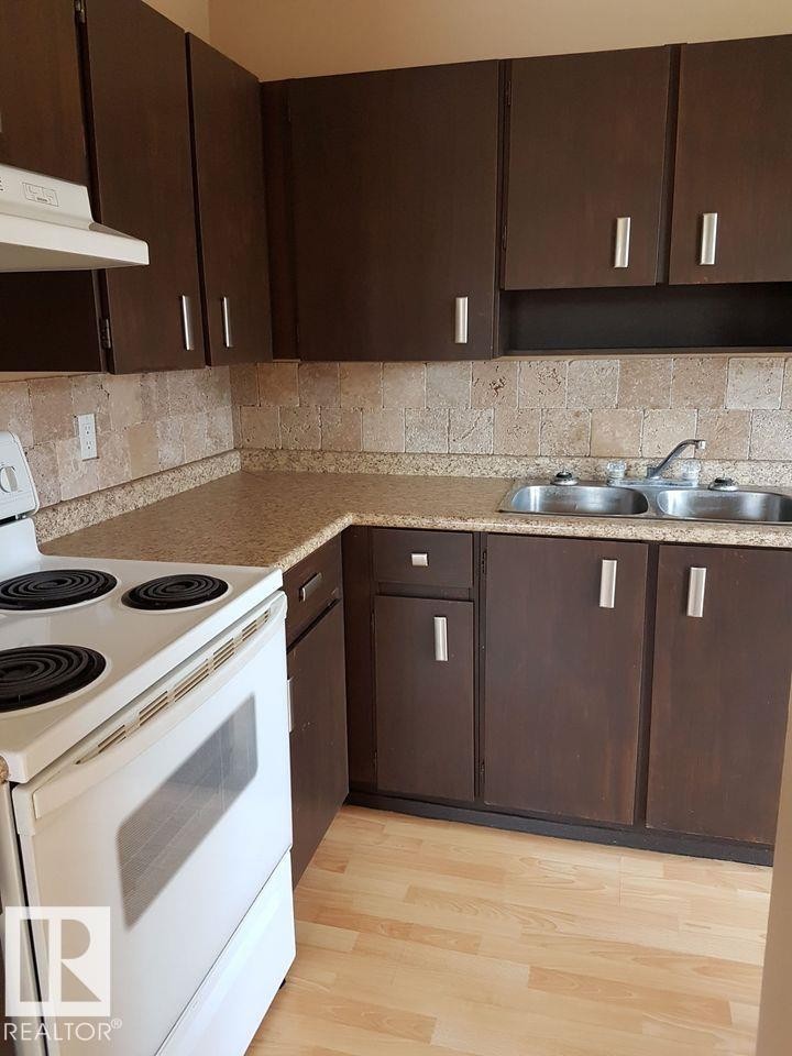 5014 52 Avenue, Glendon, AB - Indoor Photo Showing Kitchen With Double Sink