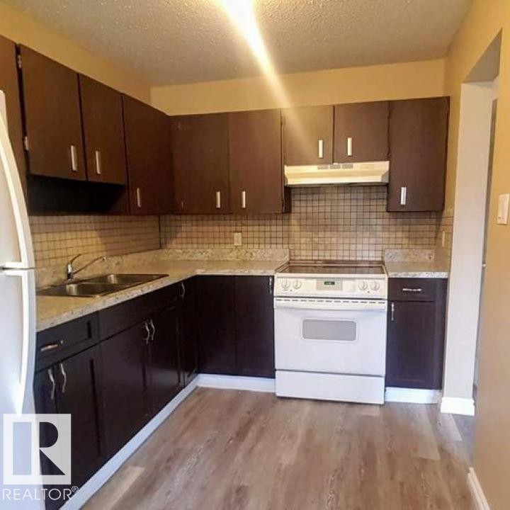 5014 52 Avenue, Glendon, AB - Indoor Photo Showing Kitchen With Double Sink