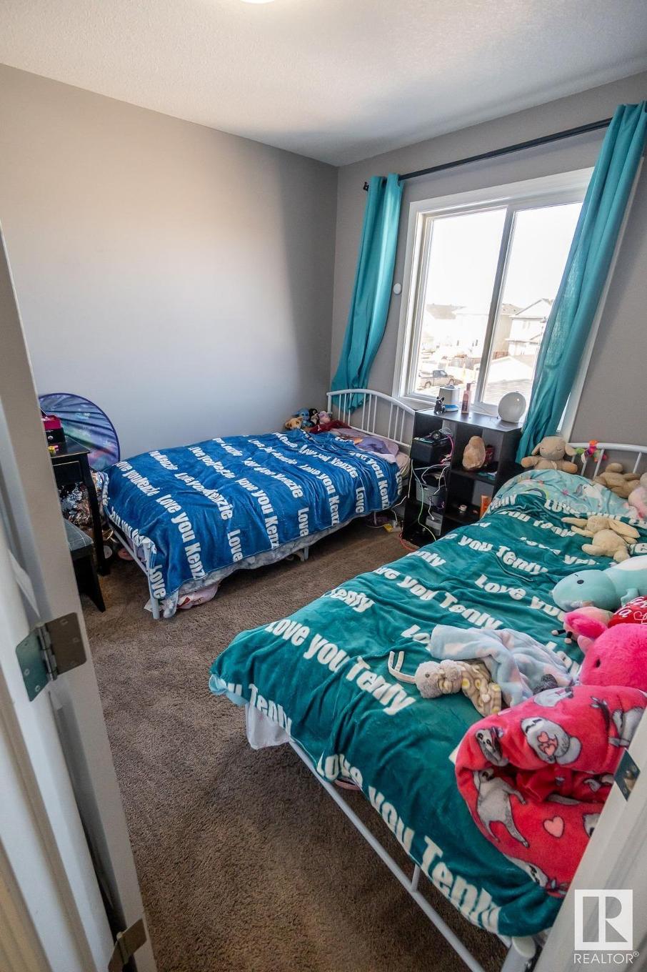 #20 Spruce Boulevard, Leduc, AB - Indoor Photo Showing Bedroom
