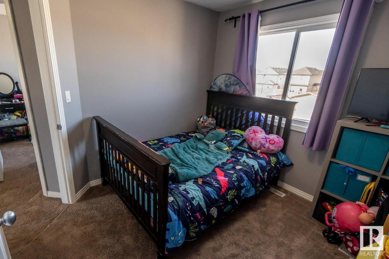 #20 Spruce Boulevard, Leduc, AB - Indoor Photo Showing Bedroom