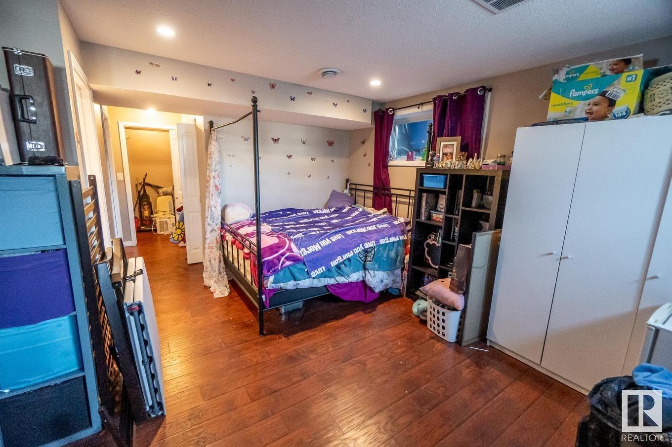 #20 Spruce Boulevard, Leduc, AB - Indoor Photo Showing Bedroom