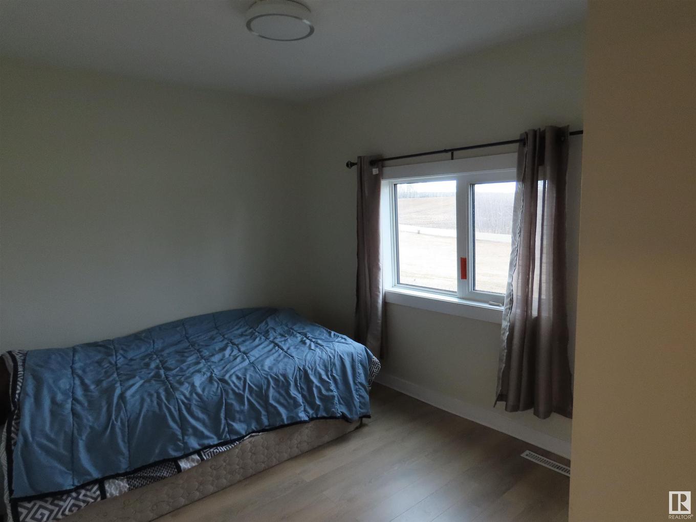 57013 Rr 70, Rural Lac Ste. Anne County, AB - Indoor Photo Showing Bedroom