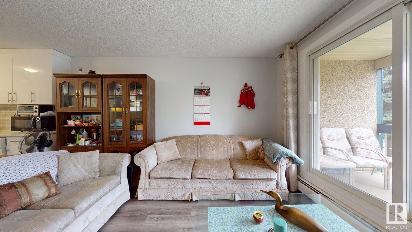 209 2620 Mill Woods E, Edmonton, AB - Indoor Photo Showing Living Room