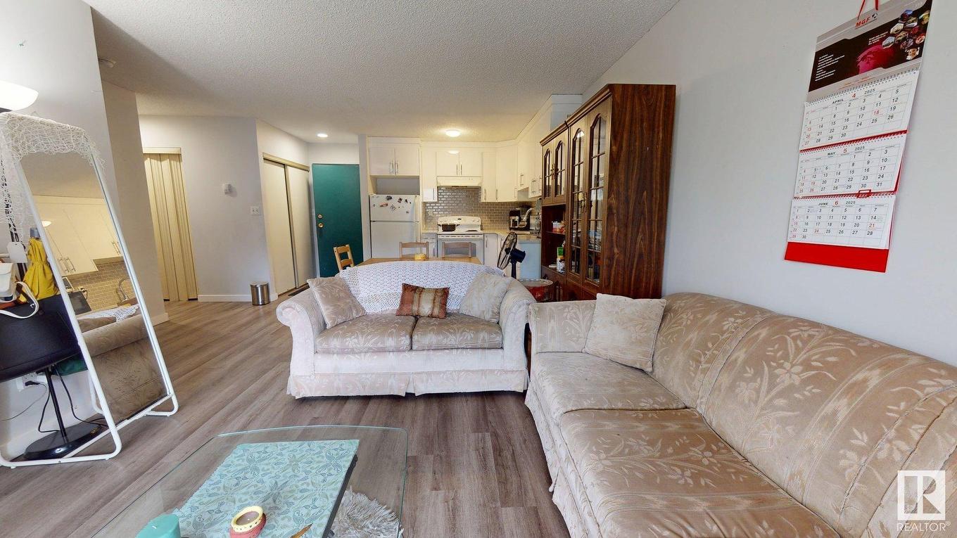 209 2620 Mill Woods E, Edmonton, AB - Indoor Photo Showing Living Room