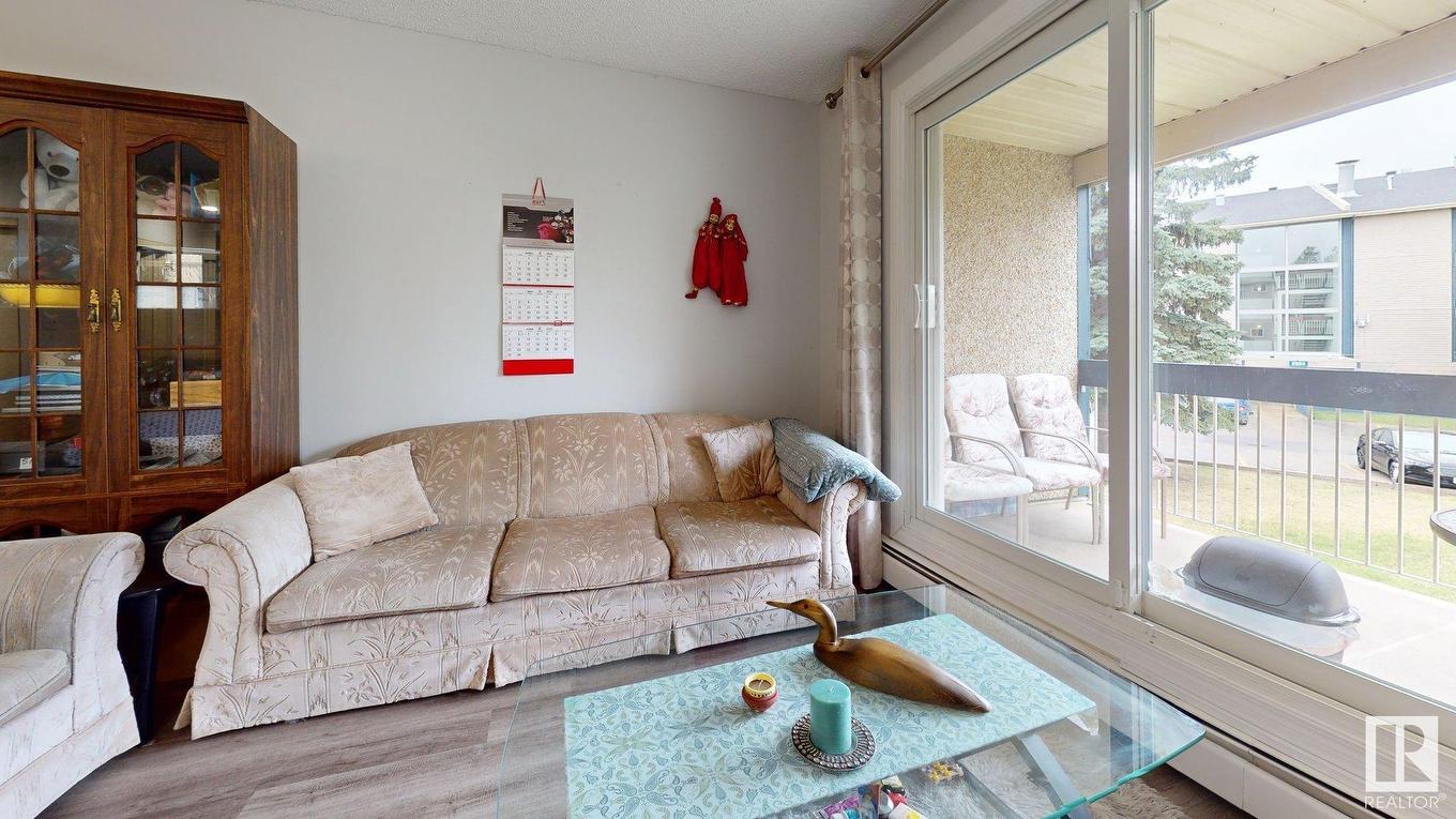 209 2620 Mill Woods E, Edmonton, AB - Indoor Photo Showing Living Room