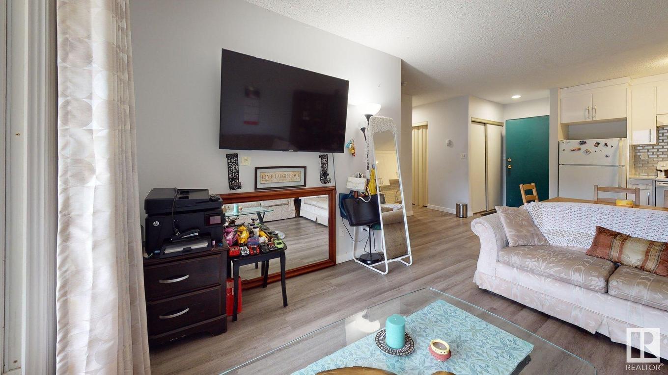209 2620 Mill Woods E, Edmonton, AB - Indoor Photo Showing Living Room
