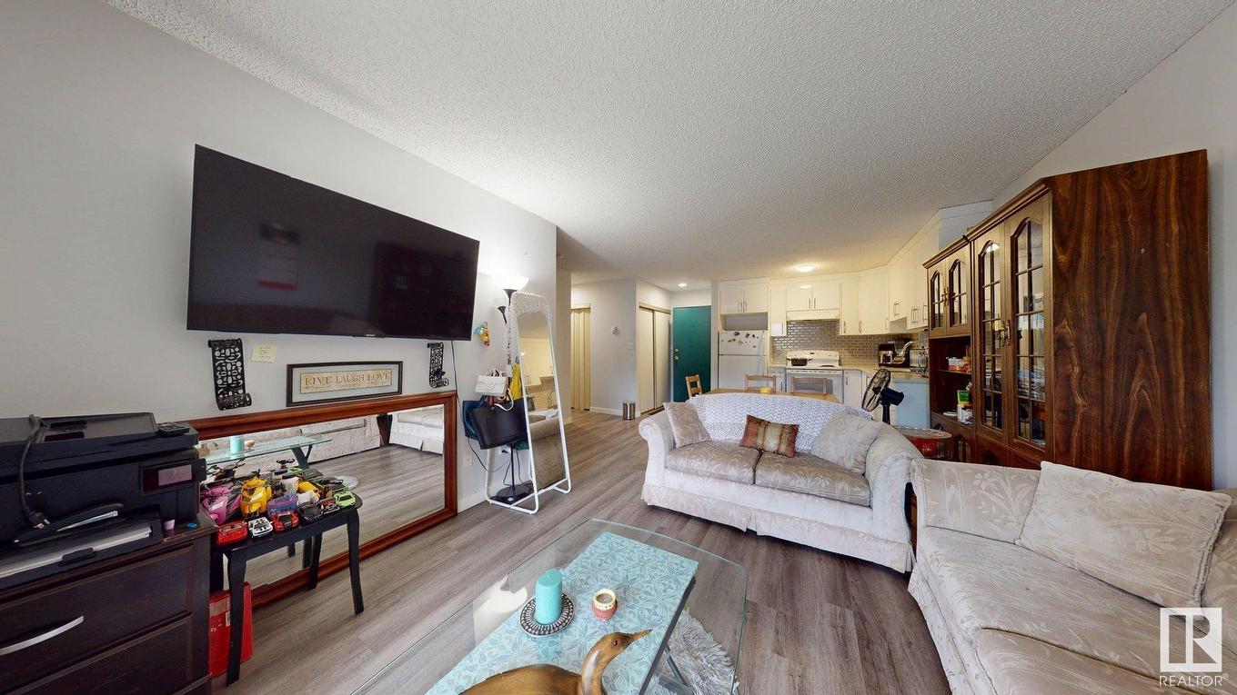 209 2620 Mill Woods E, Edmonton, AB - Indoor Photo Showing Living Room