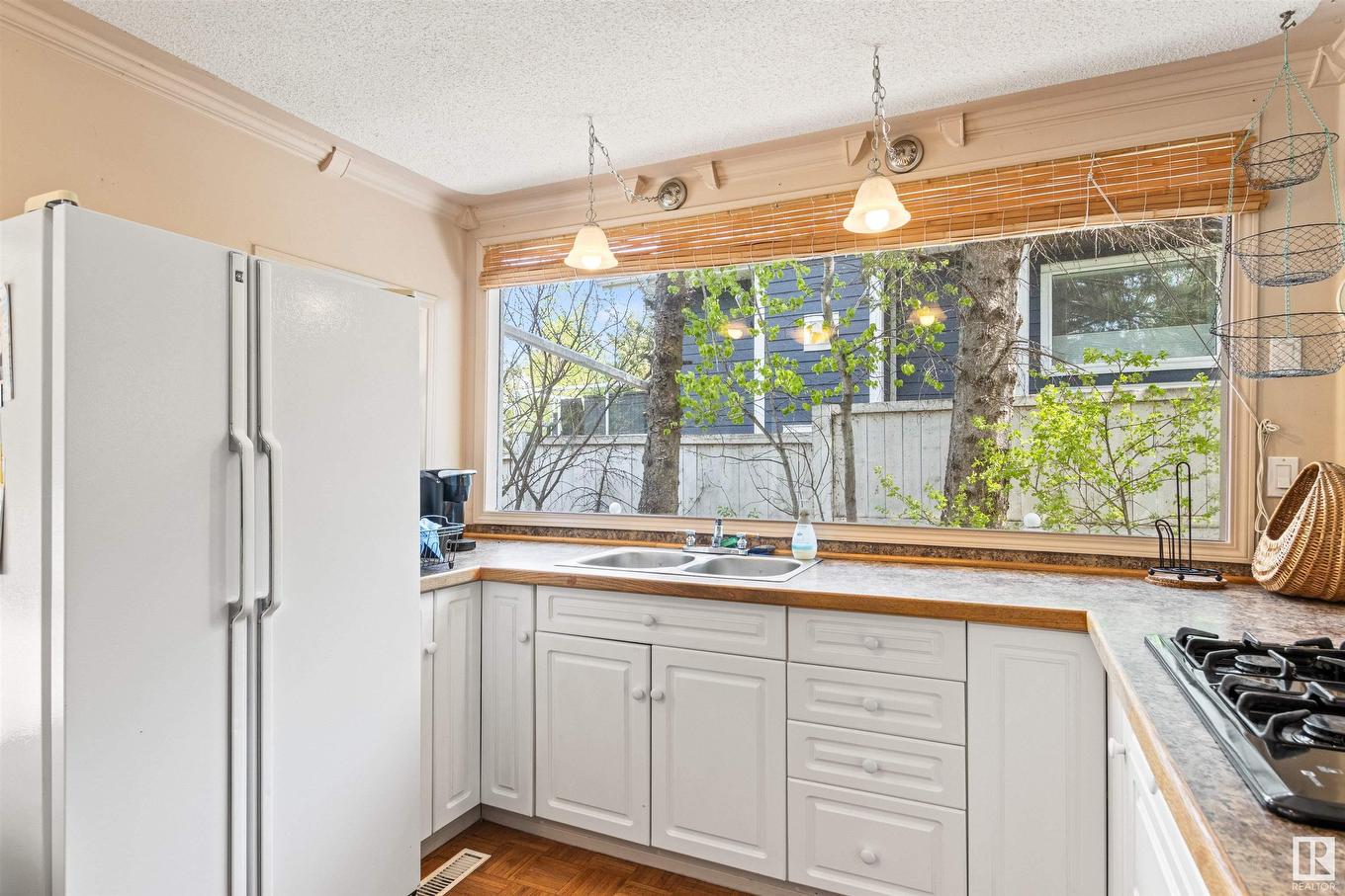 32 Marine Drive, Rural Parkland County, AB - Indoor Photo Showing Kitchen With Double Sink