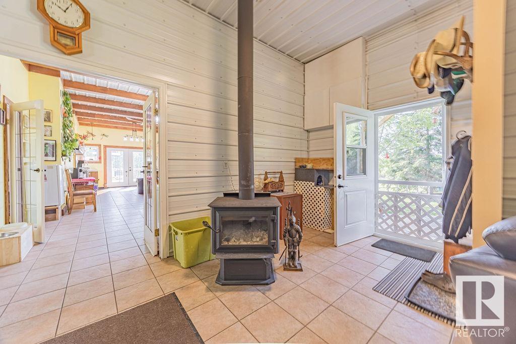 58031 Range Road 21, Rural Barrhead County, AB - Indoor With Fireplace