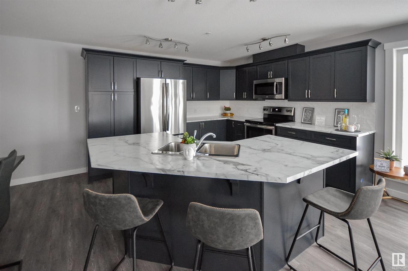 101 4110 43 Avenue, Bonnyville Town, AB - Indoor Photo Showing Kitchen With Double Sink With Upgraded Kitchen