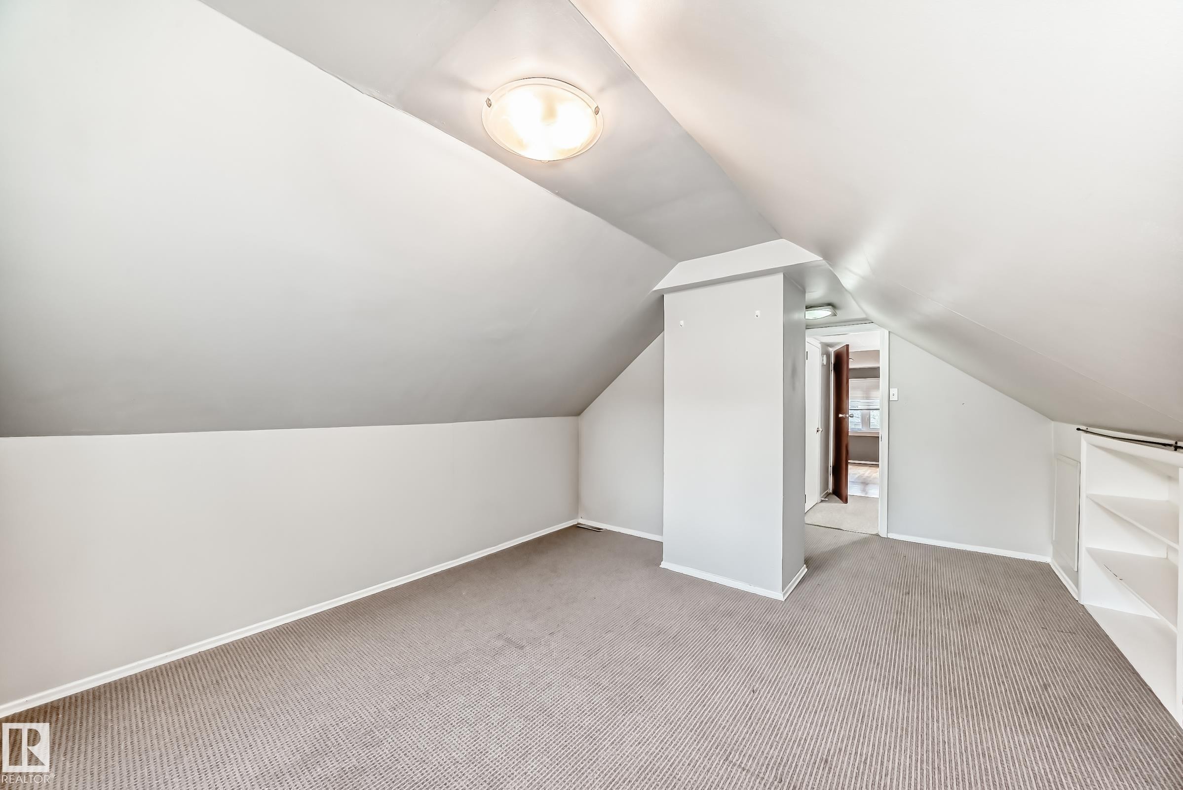 bed room featuring vaulted ceiling and carpet flooring - 12605 107 Avenue, Edmonton, AB - Indoor Photo Showing Other Room