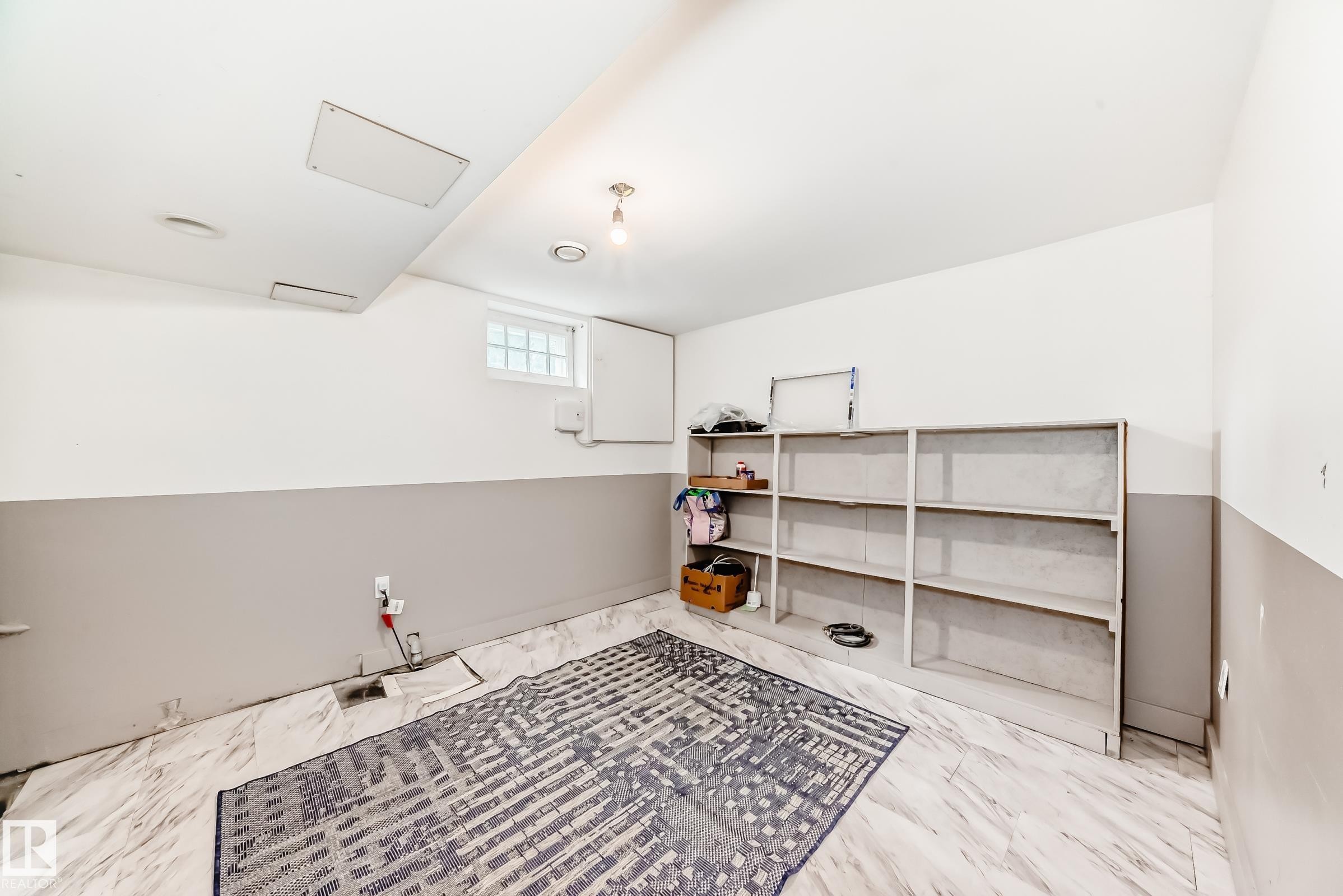 View of basement flex space - 12605 107 Avenue, Edmonton, AB - Indoor Photo Showing Other Room