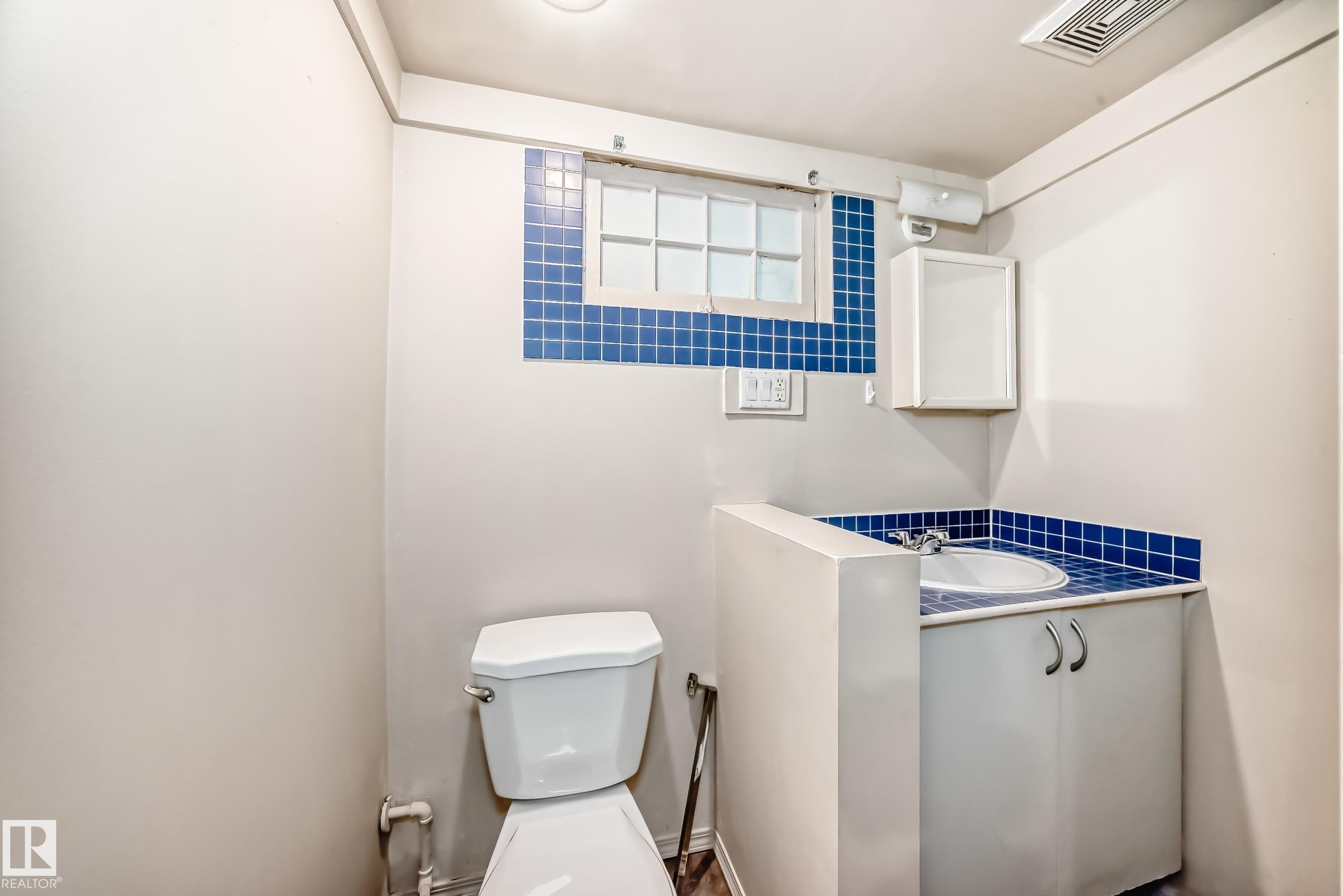 Half bathroom with toilet and vanity - 12605 107 Avenue, Edmonton, AB - Indoor Photo Showing Bathroom