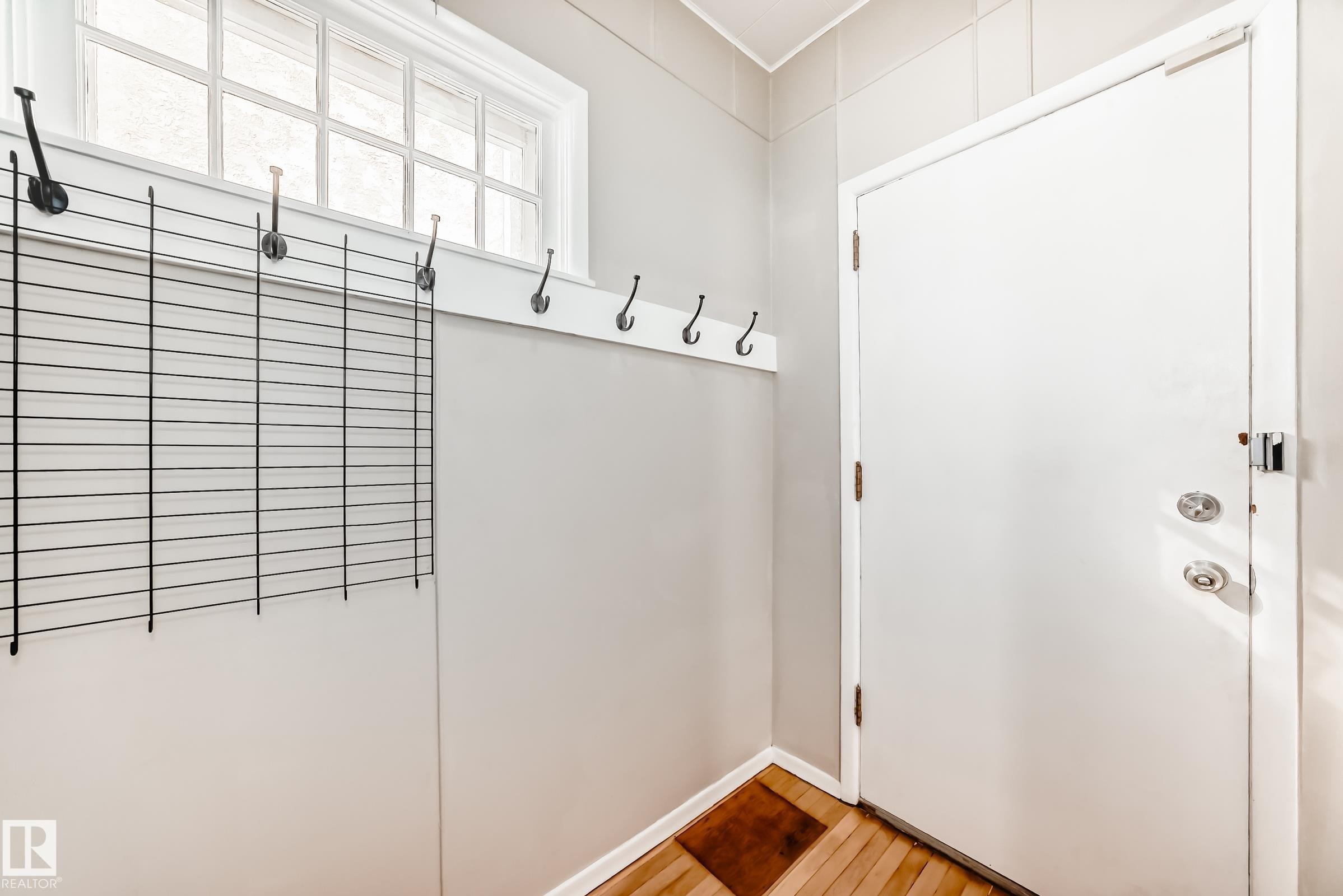entryway featuring light wood-style floors - 12605 107 Avenue, Edmonton, AB - Indoor Photo Showing Other Room