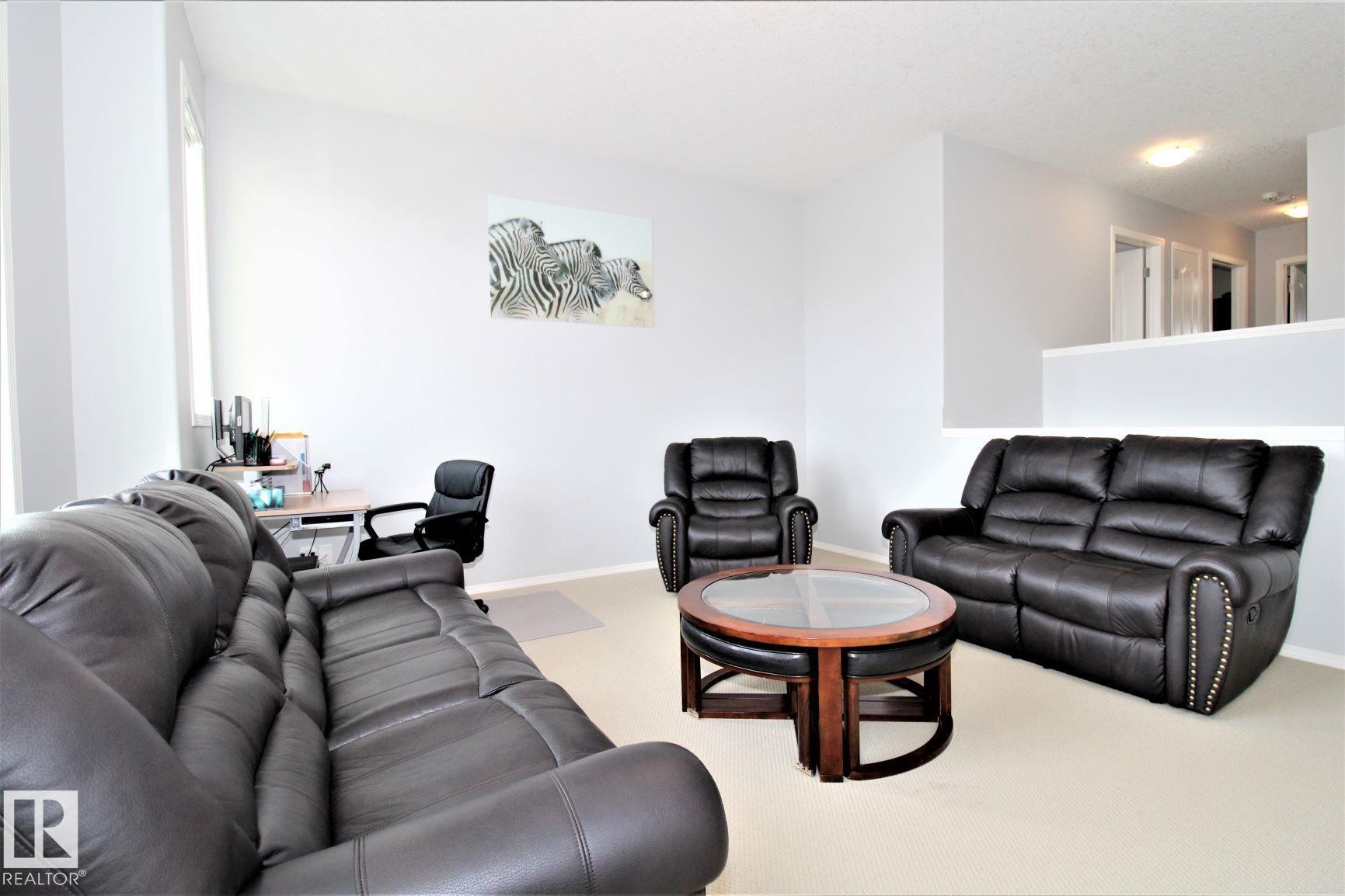 1218 37 Avenue Nw, Edmonton, AB - Indoor Photo Showing Living Room