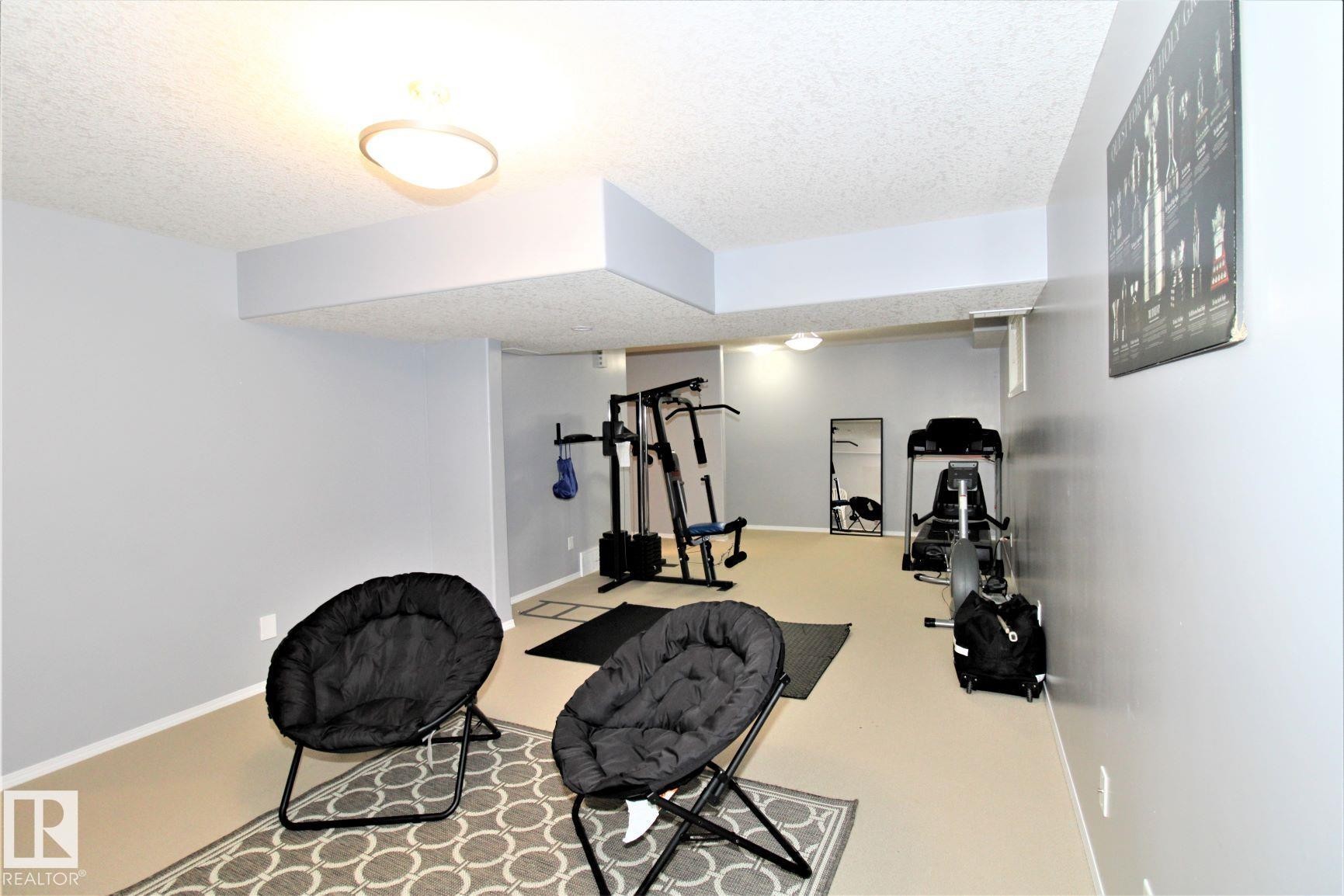 1218 37 Avenue Nw, Edmonton, AB - Indoor Photo Showing Gym Room