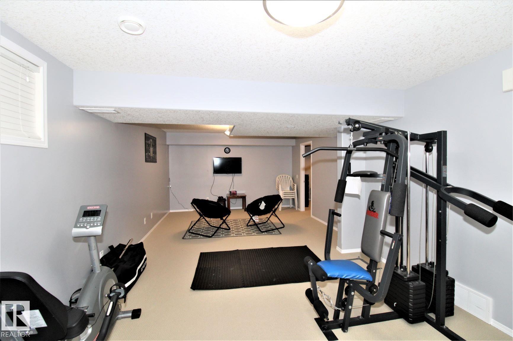 1218 37 Avenue Nw, Edmonton, AB - Indoor Photo Showing Gym Room