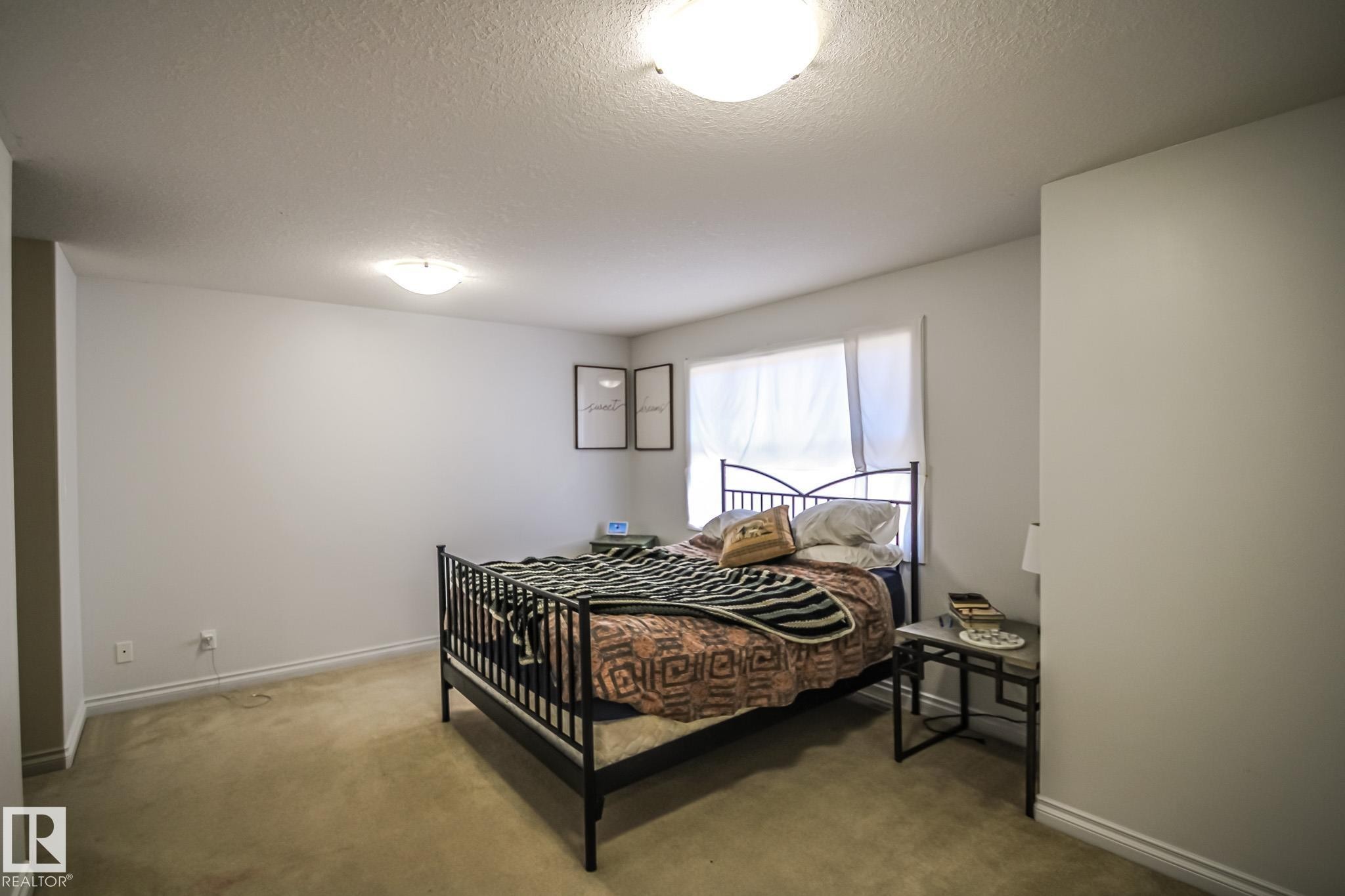 #2 1501 8 Ave, Cold Lake, AB - Indoor Photo Showing Bedroom