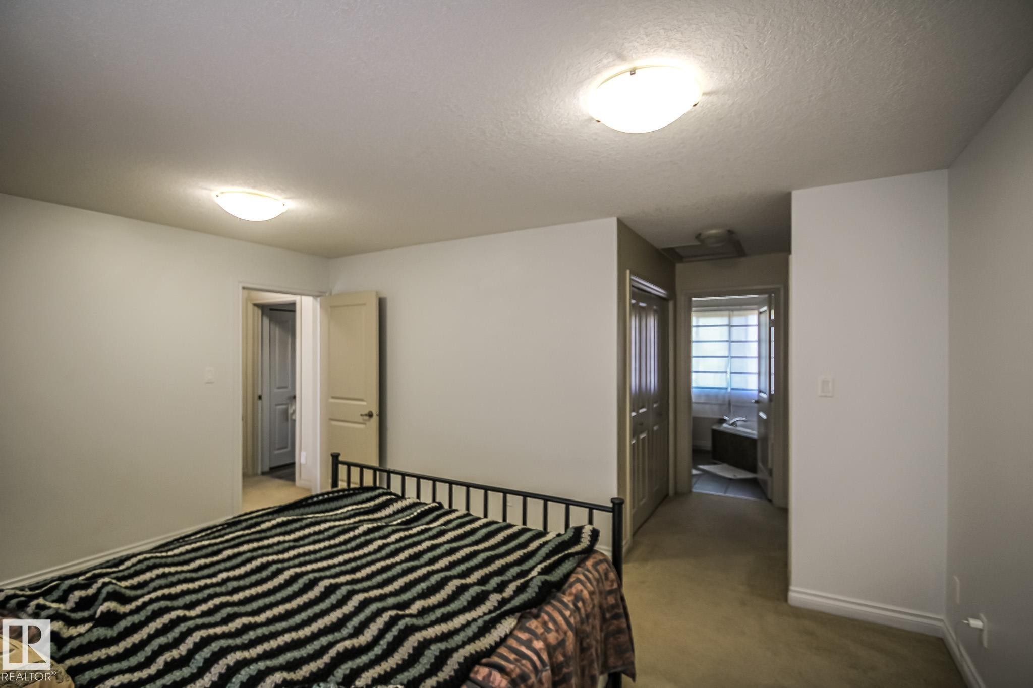 #2 1501 8 Ave, Cold Lake, AB - Indoor Photo Showing Bedroom